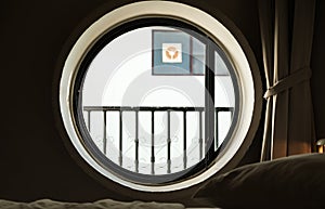 Round circle window with bright light in the morning