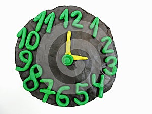 Round clock from plasticine
