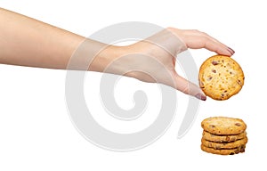 Round cookie with chocolate drops. Isolated on white