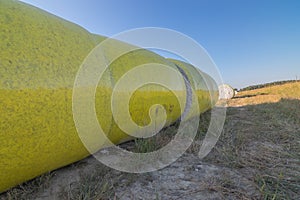 Round Cotton Bales In Autumn