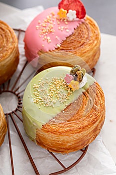 Round croissants with filling and glaze, trendy dessert