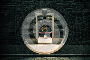 Round doorway at the Pak Tai Temple on Cheung Chau Island in Hong Kong, China photo