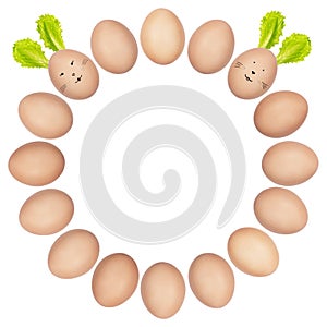 Round Easter frame made of brown eggs. Closeup photos of isolated eggs, some of them with funny rabbit faces and ears.