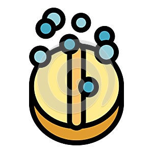 Round effervescent pill dissolving in water creating bubbles