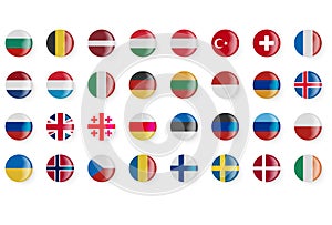 Round flags of different countries. Pin buttons.