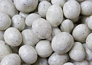 Round in the form of dragee eggs photo