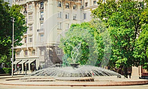 Round fountain in the center of Sofia in sunny day photo