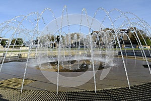 Round fountain in operation Sprinklers photo