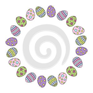 Round frame with painted eggs for Easter.