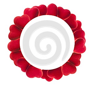 Round frame of red velvet hearts