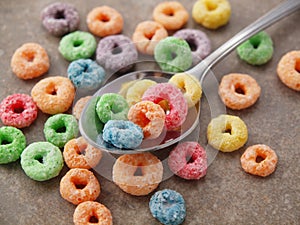 Round Fruit sugar Cereal on Spoon