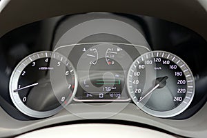 round gauge of car dashboard panel, engine display luxury modern car interior