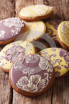 Round gingerbread cookies with icing flower close-up. vertical