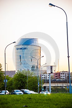 Round glass, modern, contemporary business offices building Barclays or Green Hall on Upes 21 street in Vilnius, Lithuania