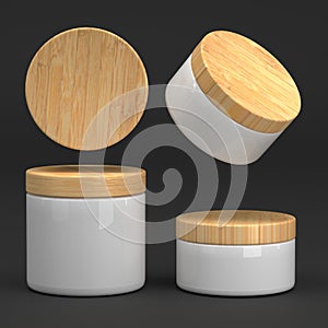 Round glossy black and clear glass cosmetic jars with wooden lid