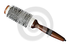 Round hairstyling brush isolated on white