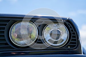 Round headlight on a old BMW car