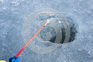Round hole. winter season, ice hole for fishing