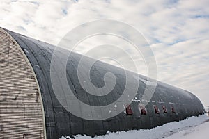 Round Long House in Snow