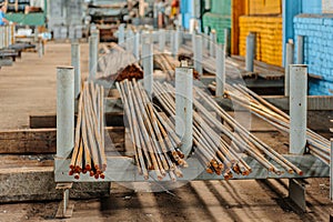 Round metal profile in packages in the warehouse of metal products