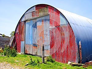 Round Metal Shed with Mismatched Paint