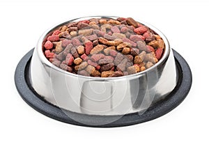 Round metal stainless steel bowl with dried food with vegetables for pets, animals isolated on white background