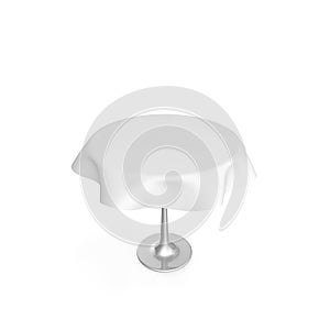 Round metal table with white tablecloth. There is room for Your design. Isolated white background