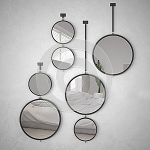 Round mirrors hanging on the wall reflecting interior design scene, minimalist white bedroom, modern