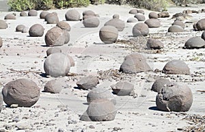 Round o-shaped stones in Ischigualasto desert, Argentina photo