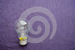 A round, ordinary, non-economical incandescent bulb