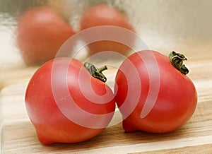 Round Pink tomato with a nose
