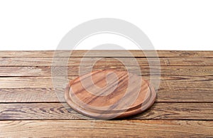 Round pizza food cutting board on brown wooden table isolated on white background. Wood tray plate and table top view. Empty copy