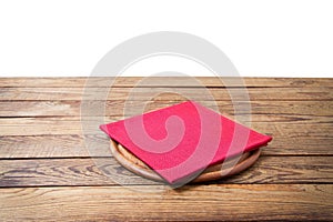 Round pizza food cutting board and table cloth red napkin on brown wooden table isolated on white background. Wood tray plate