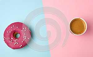 round red glazed donut and paper cup with coffee