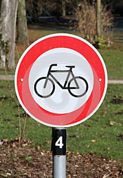 Round road sign in red and white
