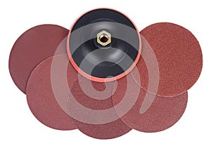 Round sandpaper discs and plastic bracket handle. Serie of tools