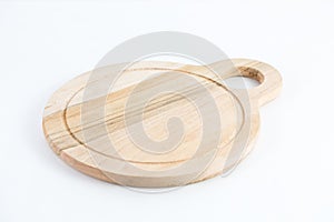 Round-shaped wooden chopping board isolated on a white background