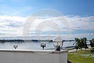 Round shiny lantern close-up. Bright summer day in the Strelka of Yaroslavl