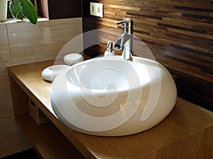 Round sink in a modern bathroom