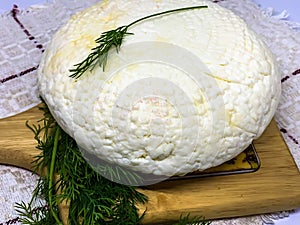 Round soft white homemade cheese