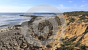 Round stacked stones on the shore