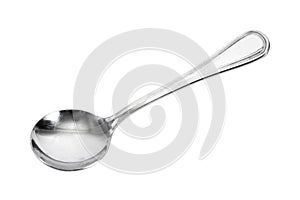 Round stainless steel soup spoon isolated on white background