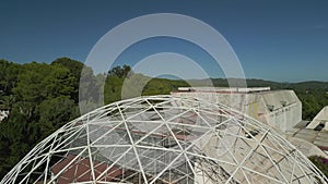 Round steel dome overview roof of party hall. Stunning aerial view flight drone