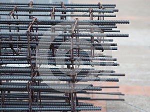 Round steel stacks are tied with Spirals steels sheath to make the concrete column for building construction