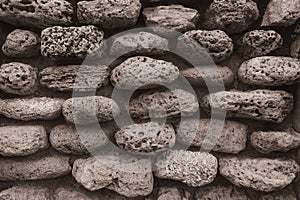 Round Stone Wall Sepia. Old Castle Stone Wall Texture. Stone Wall Background Or Texture. Part Of Stone Wall. Background