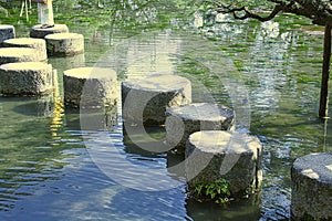 round stones in a pond