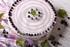 Round striped currant cheesecake close-up horizontal