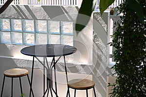 round table and chairs in the garden