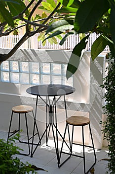 round table and chairs in the garden