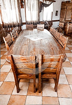 Round table in dining room with wooden chairs